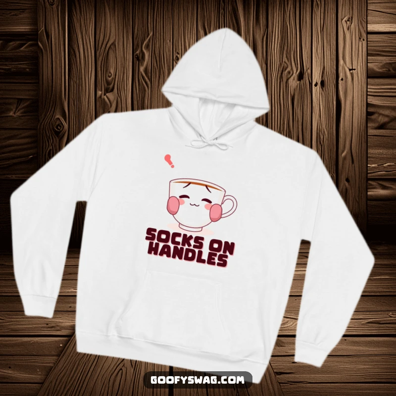 Funny hoodie featuring a confused teacup with socks on its handles, offering cozy charm and a touch of playful humor.