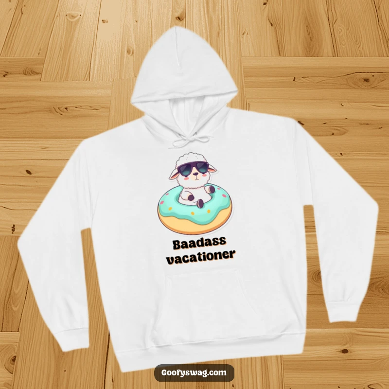 Funny hoodie featuring a fluffy sheep in sunglasses lounging on a giant donut float, offering cozy comfort and humorous vacation vibes.