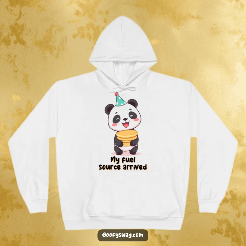 Funny beaming panda in a party hat balancing pancakes, a cozy and humorous hoodie for ultimate comfort.