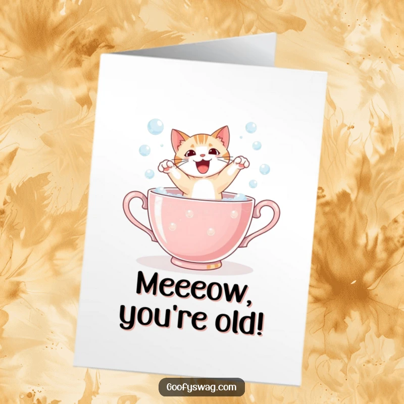 Funny Free Printable Birthday Card: Startled cat bursts from a bubbly teacup, eyes wide, cartoon humor, DIY download.
