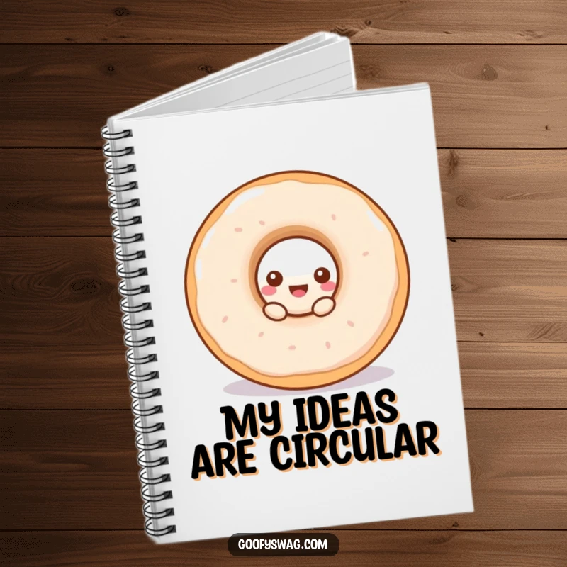 Funny doughnut notebook featuring a curious doughnut peeking from a bigger one, great for notes and sketches.