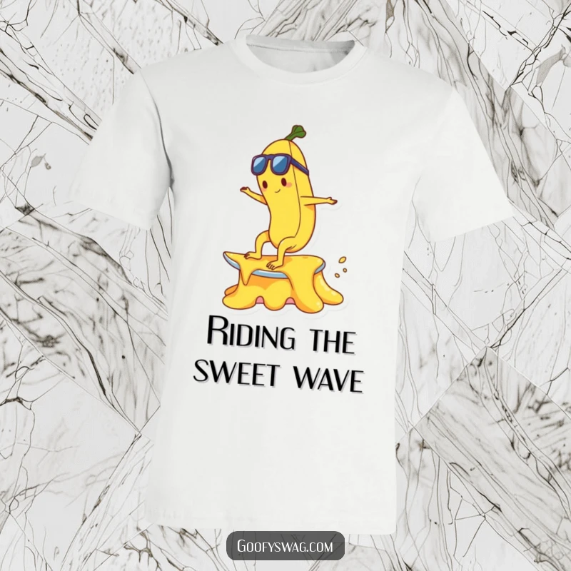 Funny happy banana character attempting to surf a melting ice cream cone on a soft cotton t-shirt.