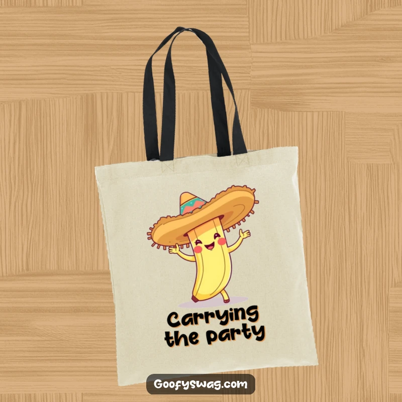 Funny tote bag showcasing a banana peel wearing a sombrero and doing the cha-cha, ideal for carrying party supplies and essentials.